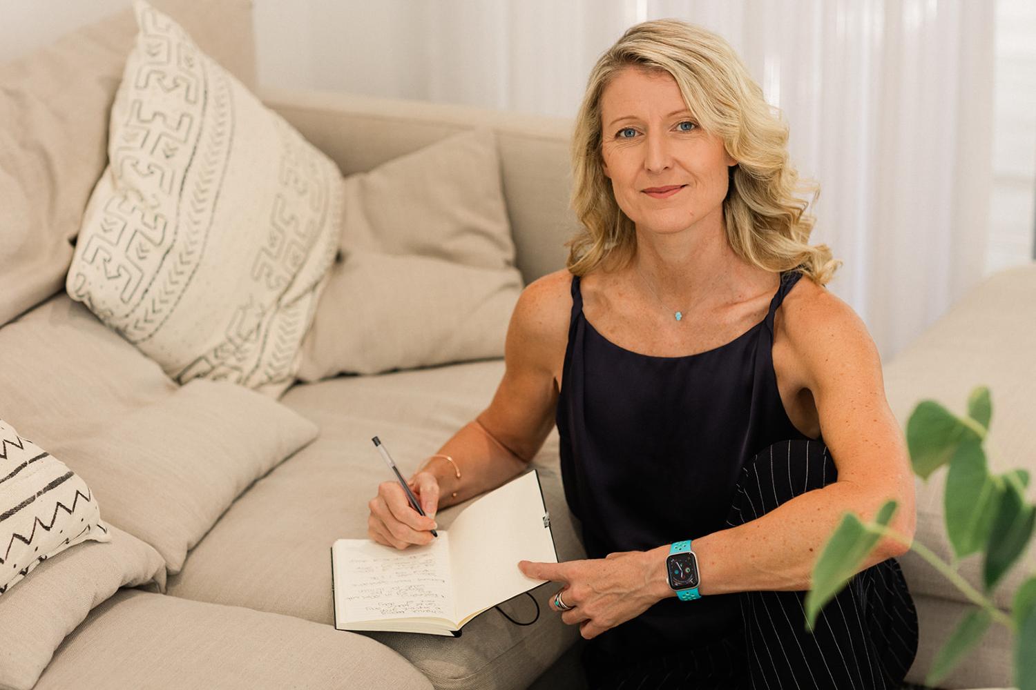 Jo Grabyn writing clinical notes